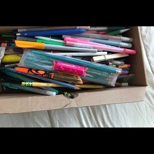 shoebox of pens and stuff